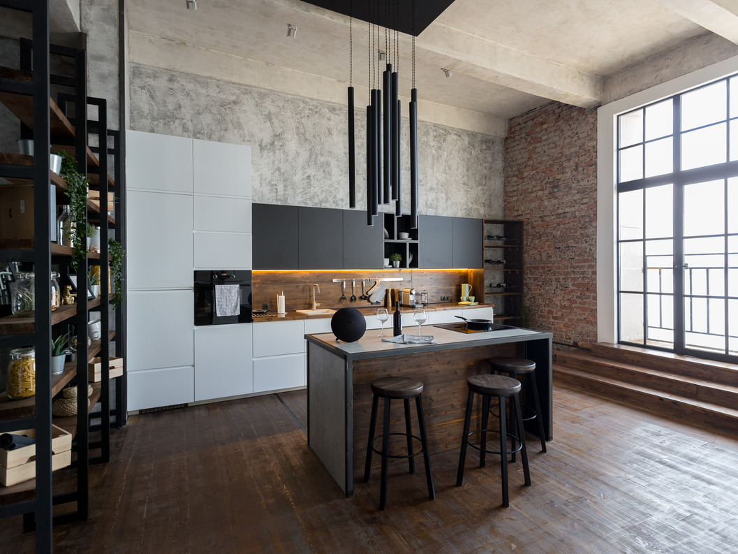 Inspired by factories and warehouses, industrial design incorporates raw and unfinished elements like exposed brick, metal, and reclaimed wood. It often features open spaces, high ceilings, and a combination of modern and vintage furniture.